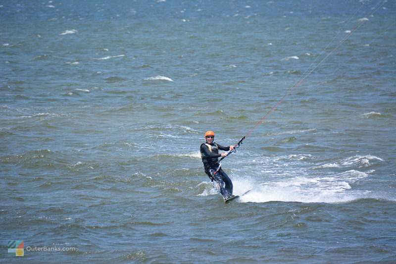 A kiteboarder in Waves