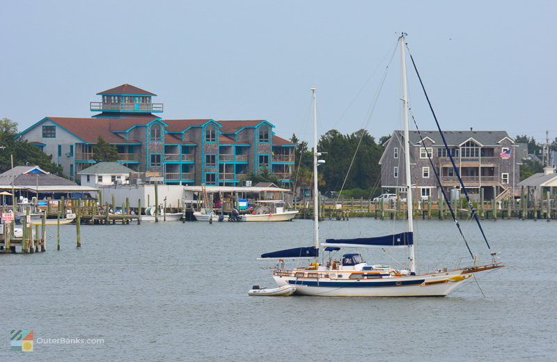 A sail boat anchored in Silver Lake in Ocracoke