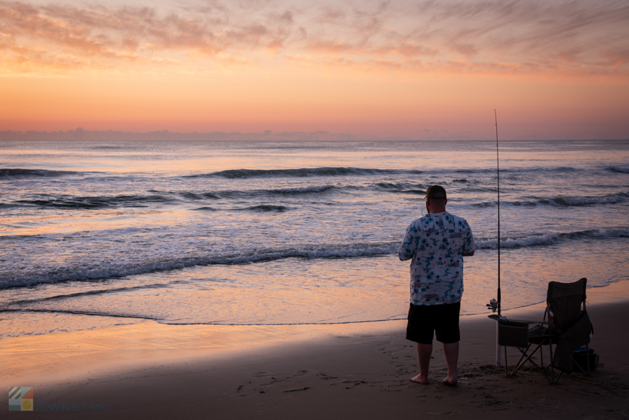 Surf fishing next to Outer Banks Fishing Pier