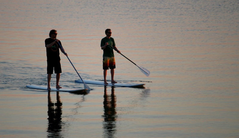 Stand-Up Paddle Boarding in the evening