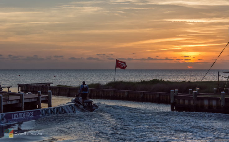 Taking out a jet ski at sunset