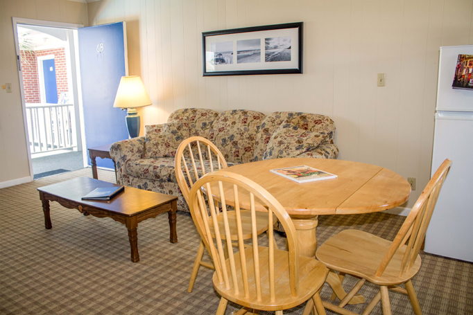 Colonial Inn guest room couch and table