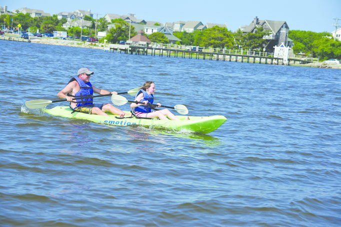 A tandem kayak on the sound from Sunset Watersports