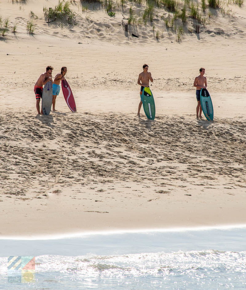 Skim boarding on the beach in Kill Devil Hills, NC