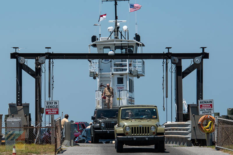 Cars disembark the ferry on Ocracoke, NC